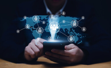 Digital Communication and Collaboration with Business People Exchanging Information Data online meeting working together around the world using a smartphone. Business interaction with digital icons.