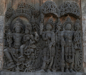 Intricate carvings and sculptures of the Hoysala temples in Belur, India.
