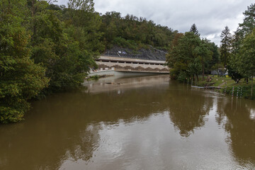 Obraz premium River Svratka and Svitava in the city of Brno, Czech Republic. Diluted water during the rainy season.