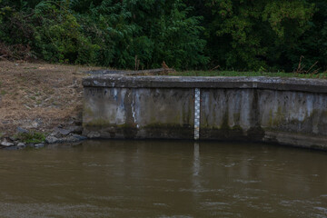 Fototapeta premium River Svratka and Svitava in the city of Brno, Czech Republic. Diluted water during the rainy season.