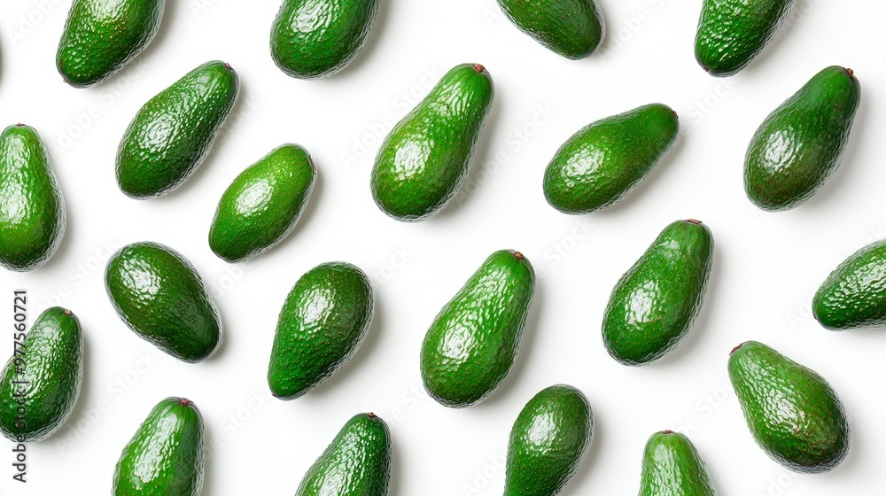 Canvas Prints This is a flat lay view of a pattern of avocado slices with the halves isolated on a white background, a summer fruit that is packed with vitamins and nutrients for summer consumption.