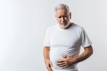 American elder man suffering from abdominal discomfort.