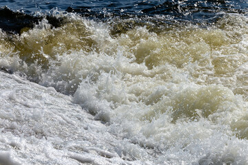 water flowing into the river