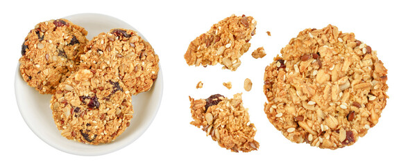 Granola cookie in ceramic bowl isolated on white background with full depth of field. Top view. Flat lay.