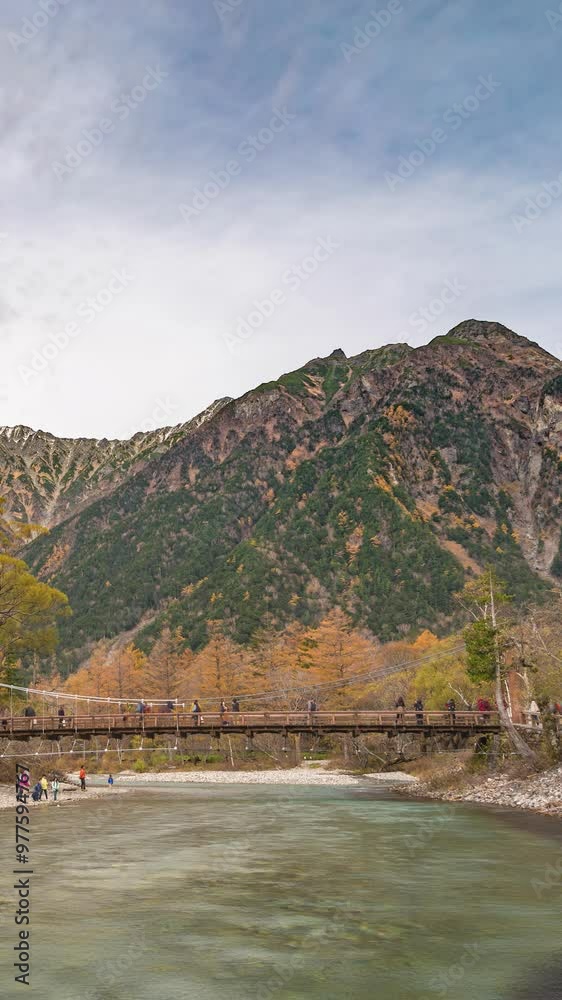 Sticker Nature landscape at Kamikochi Japan time lapse of autumn foliage with Kappa Bridge (Kappabashi) (Vertical)