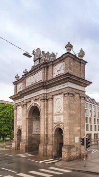 Innsbruck Austria time lapse city skyline at Triumphpforte Arch (Triumphal Arch) (Vertical)