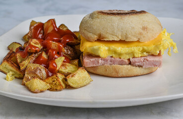 spam and scramble egg on a english muffin