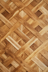Texture pattern of natural parquet flooring. Parquet floor surface. Abstract backdround with copy space.