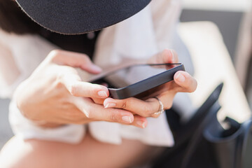 Close-up of Hand Holding Smart phone Outdoors