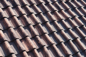 Weathered Terracotta Roof with Missing Tiles