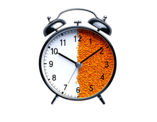 Creative alarm clock with a unique design showcasing a half orange face isolate on transparent background, png, cutout
