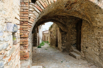 Naklejka premium The medieval village of Tursi in Basilicata, whose alleys retain their original appearance, with stone houses, arches and narrow passages, typical of an ancient fortified medieval village