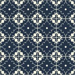 Fototapeta premium A blue background with a pattern of flowers 