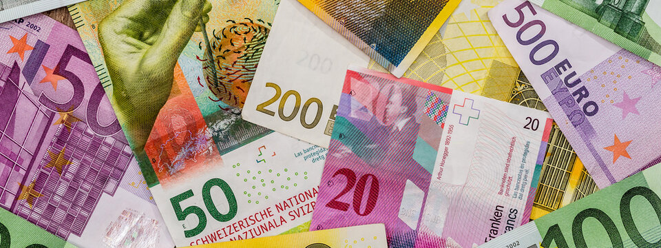 euro and Swiss franc monmey as background