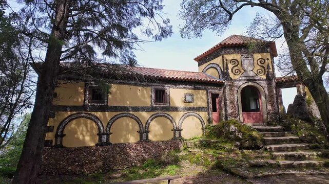 Calvary chapel in the way to the cross, via crucis, trail on ancient forest of Bussaco, in Luso, Mealhada, Aveiro in Portugal.
