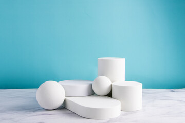 White Stands against blue and marble background