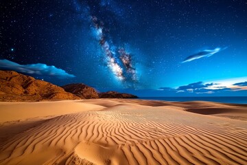 Naklejka premium Starry skies over a wind-swept desert, the stars shining brightly in the crystal-clear night