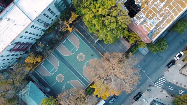 Aerial top down Prospect Heights Brooklyn city empty tennis court during fall New York City NY