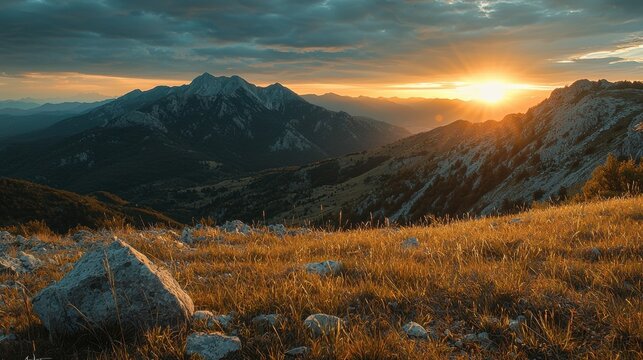 A photo of a mountain landscape during sunset