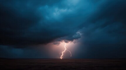 A powerful and dramatic image of a lightning bolt striking the horizon, set against a backdrop of dark and ominous storm clouds, showcasing nature's raw power.