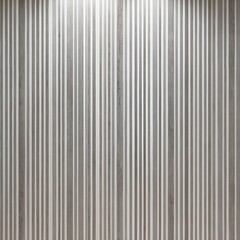 Obraz premium vertical striped pattern on a wall. The stripes are evenly spaced and have a subtle texture, resembling a marble or stone finish