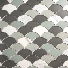 Obraz premium wall covered with a pattern of overlapping, scallop-shaped tiles. The tiles are arranged in a fish scale layout, creating a visually appealing texture
