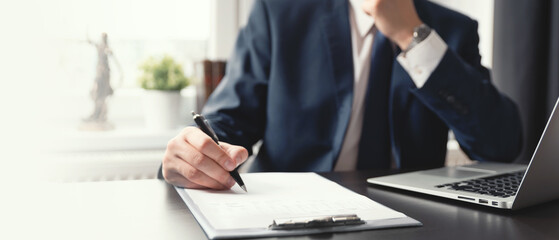 Notary public signing paper contract