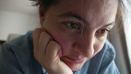 Close-up of a woman’s thoughtful expression, revealing deep contemplation and introspection. an intimate moment of reflection and emotional depth