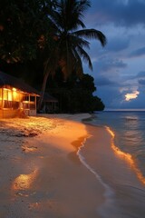 Fototapeta premium Tranquil tropical beach at dusk with glowing lights and gentle waves