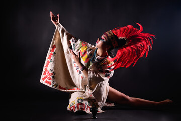 Aztec dance on black background
