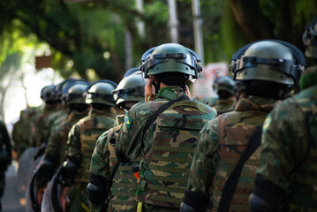 Army soldiers are seen standing during the celebration of Brazilian Independence Day. City of Salvador, Bahia.