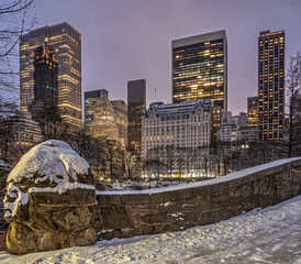 Gapstow Bridge in Central Park, snow storm winter