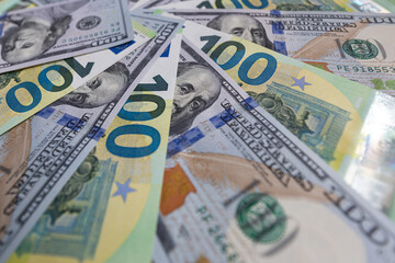 US 100 dollar and 100 euro banknotes background for design purpose