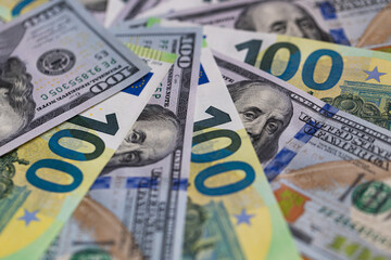 US 100 dollar and 100 euro banknotes background for design purpose