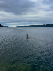 Solo, early morning paddleboarding on calm waters