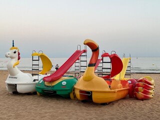 Pedal boats with slide on the beach, vacation mood, fun, summer, holidays