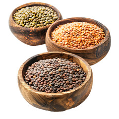 Obraz premium Brown, green and red lentils are filling wooden bowls, isolated on a white background