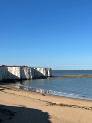 white cliff and sea