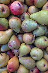 Green pears stack in market