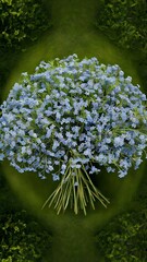 Blue Forget me not flowers on a green background