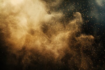 A close up view of a dust cloud suspended in air, captured against a dark black background