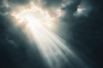 Sunlight breaking through dark clouds  natures miraculous light.