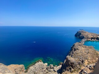 
Lindos Rhodes Greece, sea picture, sight seeing, Greece holiday, clear blue water, vacation, sea horizon, Europe, rocky sea picture, Greek holiday, mediterranean sea, ocean view, sunny day, cliffs