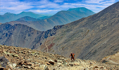 Hiker climbing to the summit of Colorado's 14,000-foot Torrey's Peak