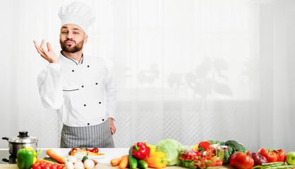 Great Recipe. Happy Chef Man Gesturing Approving Taste Looking At Camera Standing In Restaurant Kitchen. Selective Focus