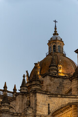 Fototapeta premium Walking in old part of Jerez de la Frontera, Sherry wine making town, Andalusia, Spain in summer, architectural details, Andalusian style, churches and towers