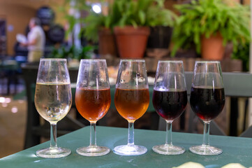 Flight of five sherry wine from barrels, fino, manzanilla, olorosso, amontillado, pedro ximenez jerez wines in old tavern, wine tasting, Sanlucar de Barrameda, Cadiz, Andalusia, Spain