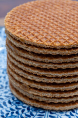 Traditional Dutch sweet dessert, Butter caramel syrup waffles, fresh baked