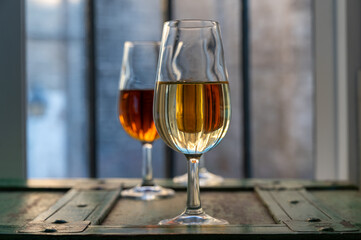 Sherry wine tasting, fino, olorosso, amontillado, cream jerez sherry fortified wine made from palomino white grape in bogedas in Jerez de la Frontera, Cadiz, Andalusia, Spain