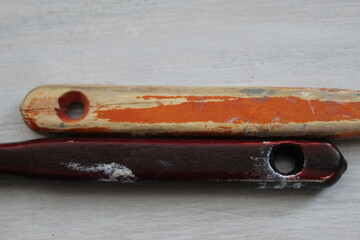closeup of wooden paintbrushes handles